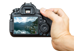 hand holding a digital camera